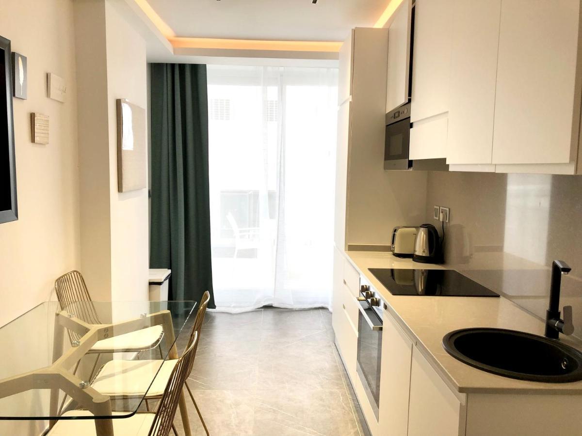 By Promenade And Apartment